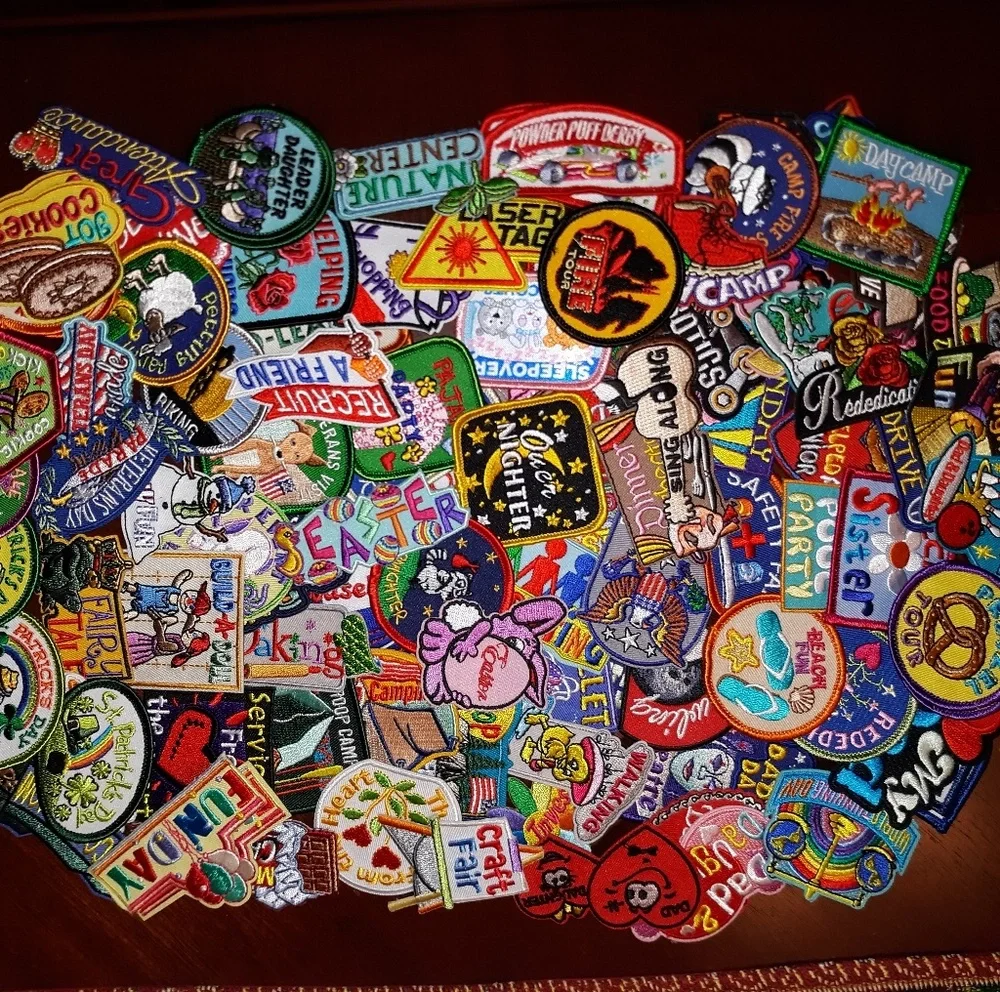 Two Binders Of Over 100 New Girl Scout Fun Patches Lot
